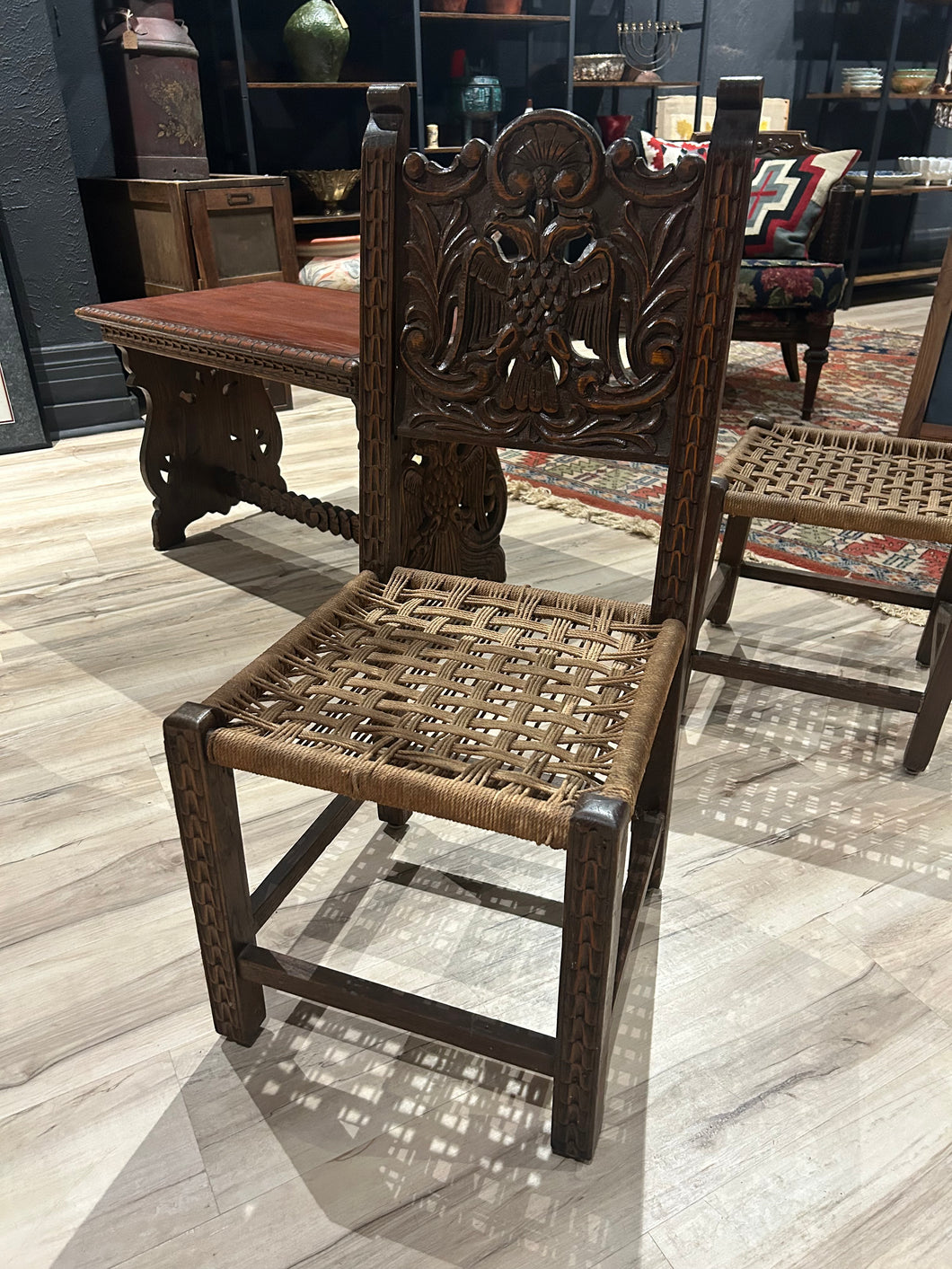 vintage hand carved chair with wicker seat