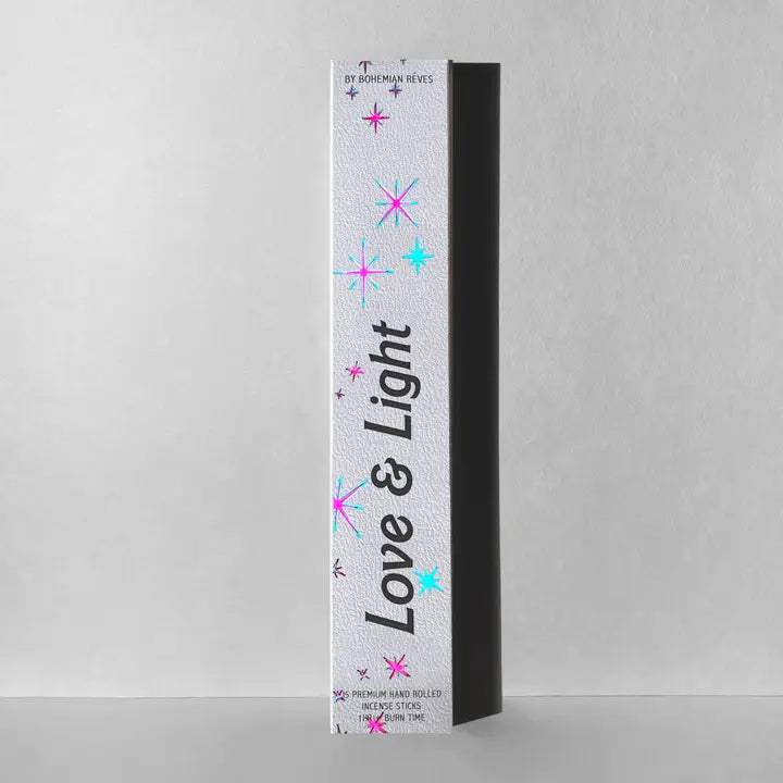 Love & Light incense packaged in a white box with blue and pink stars.